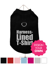 A fun, funky harness-lined t-shirt that also provides a secure harness for your dog. This t-shirt has a built-in D-ring harness and 2 under-belly / under-chest quick release buckles for comfortable control of your dog. Made from high quality 100% cotton and features a velvelty-feel cotton-flock design.